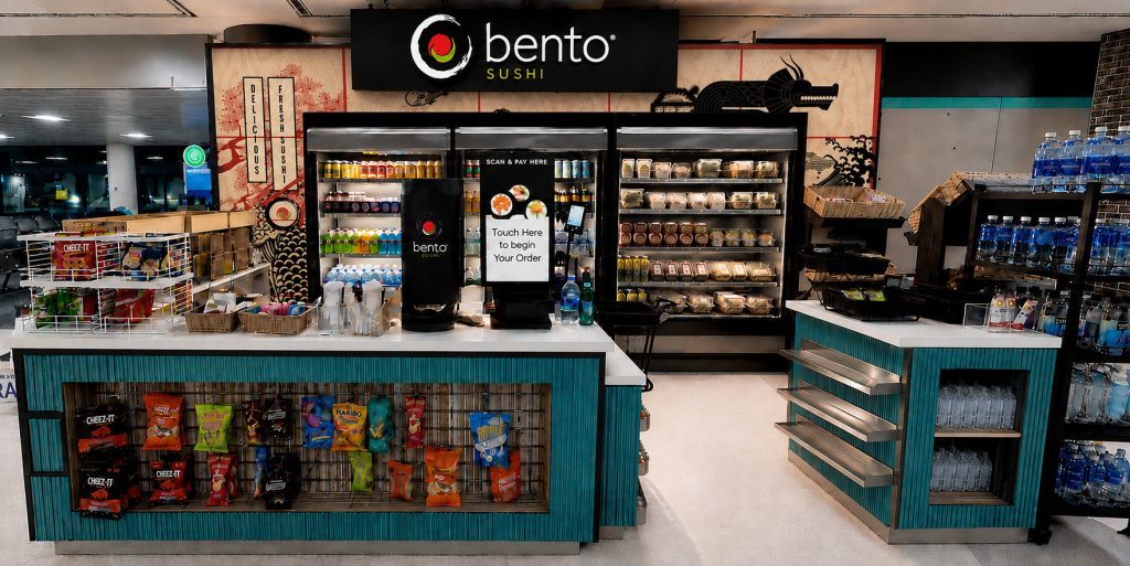 Bento Sushi kiosk with refrigerated grab-and-go sushi cases and self-order screens